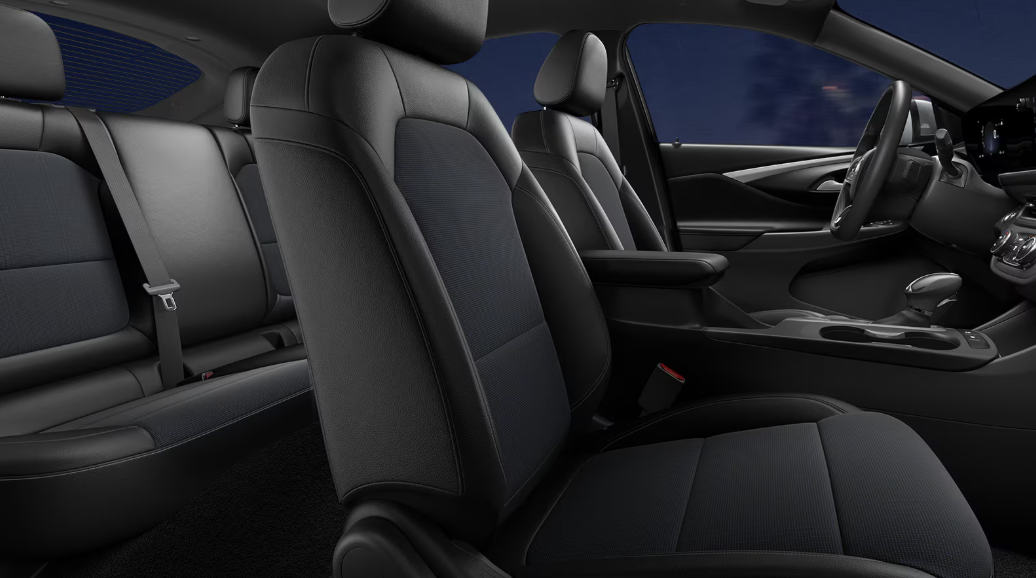 2026 Buick Envista Avenir interior showing perforated leather-appointed heated front seats and the ultrawide 11-inch HD color touchscreen