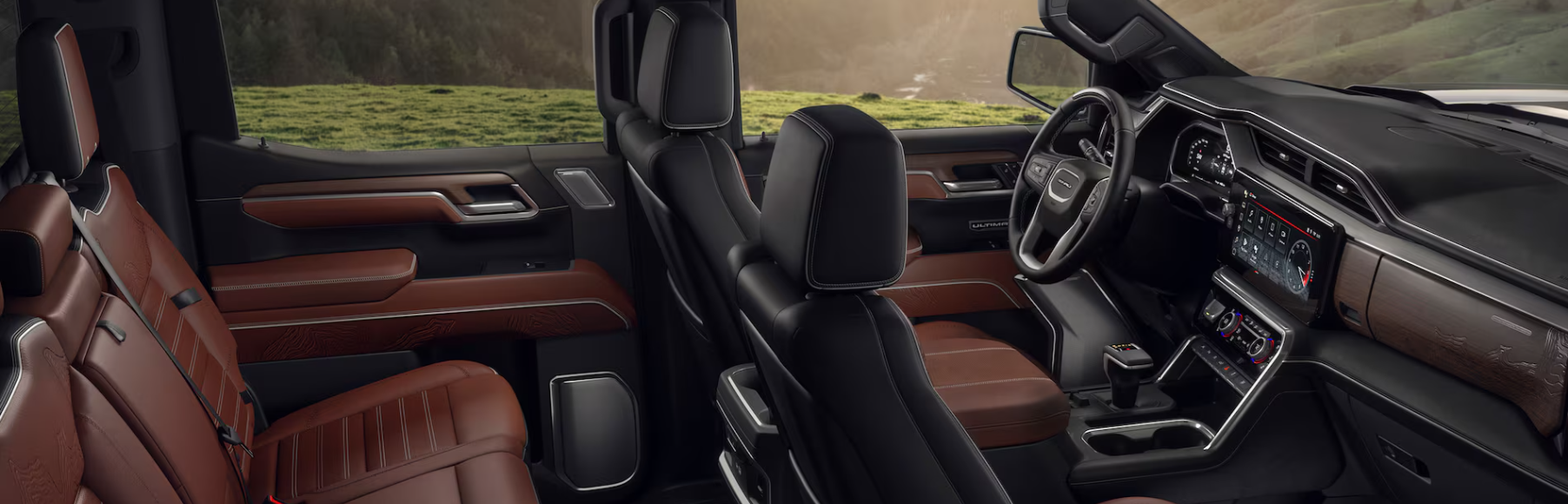 2026 GMC Sierra 1500 Denali Ultimate front seats with full-grain leather and open-pore Paldao wood trim