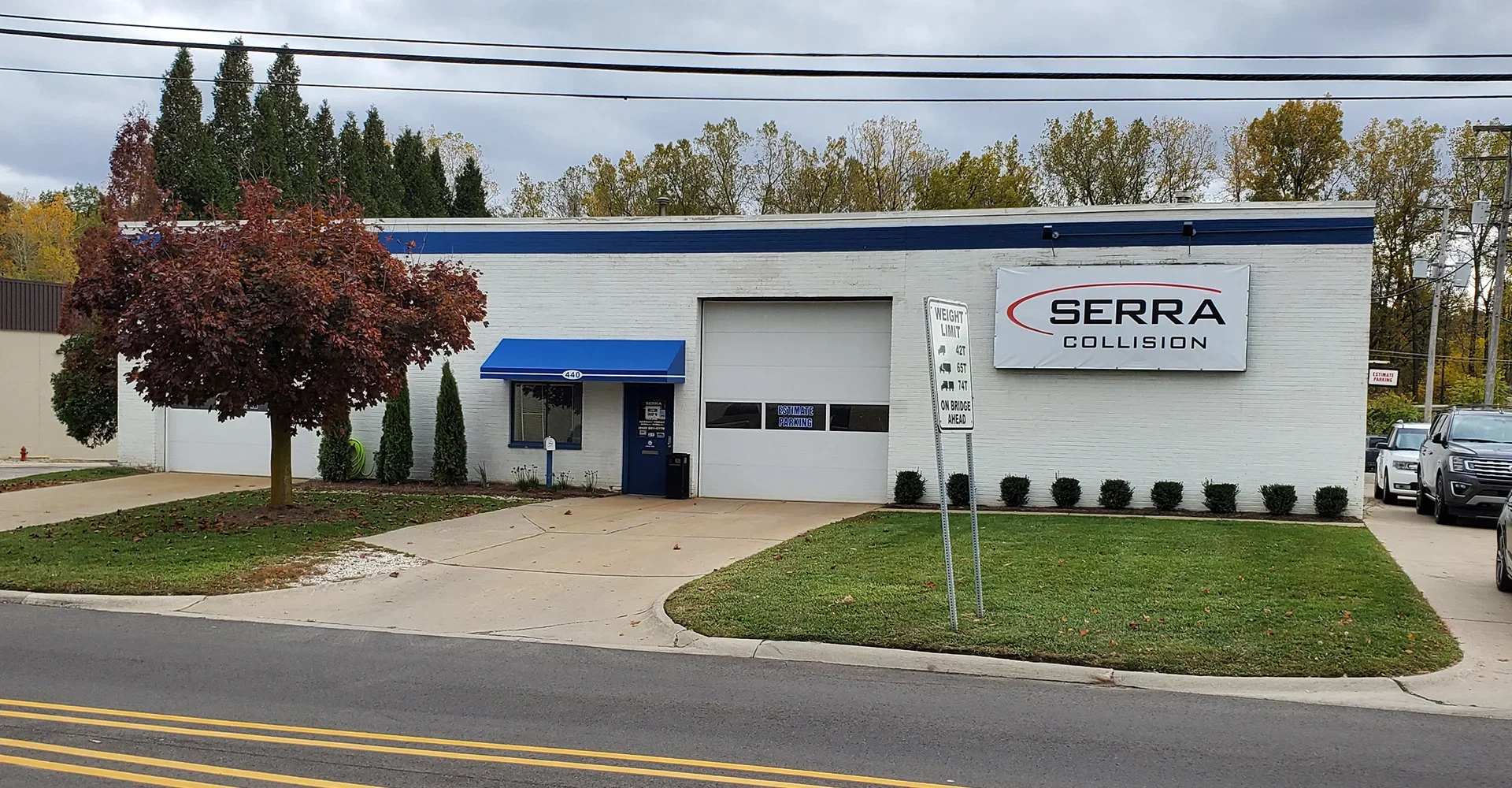 Serra Collision Center Building Exterior